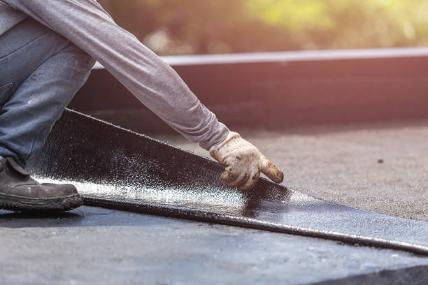 Professional Basement Waterproofing technician working in White Cottage, OH